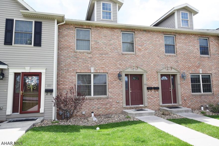 This beautiful brick front townhome has a view from the rear deck (with retractable awning) that can't be beat.   Well appointed kitchen with ceramic tile floors, center island with seating, and breakfast area.  Architectural Tuscan columns define the spaces for the open concept living and dining area.  Owner's suite includes walk-in closet and full bath.  Large family room on lower level.  One car integral garage.  This is maintenance free living at it's best.
