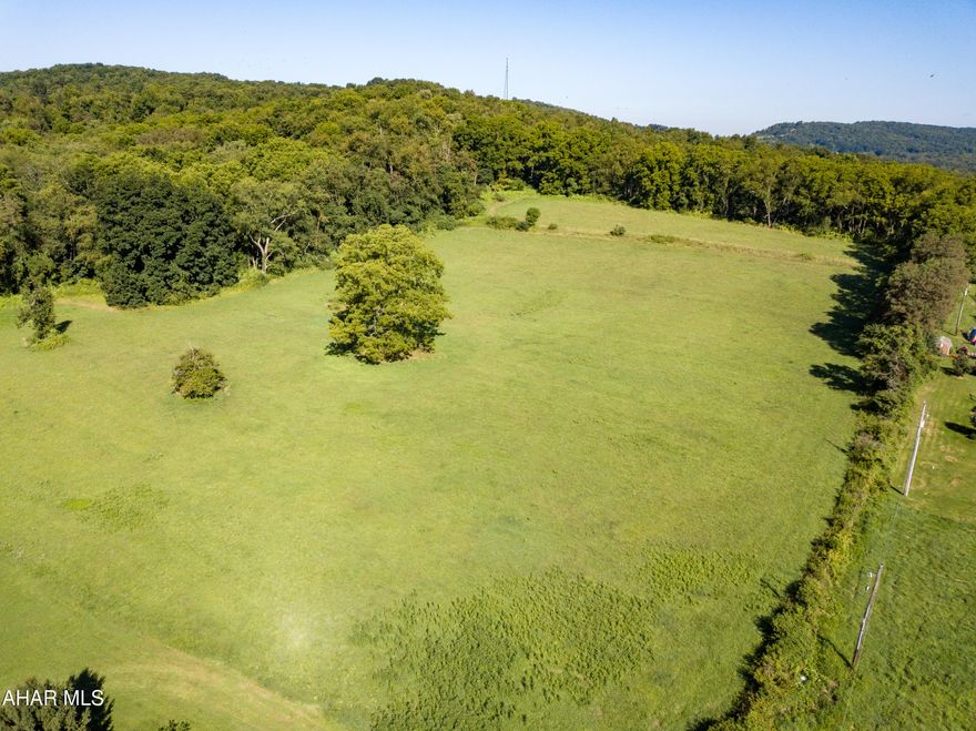 An exceptional location for various business opportunities.   This 11 acre parcel is located just off the Sunnyside Road connector to US Route 30 with easy access to I99 & PA Turnpike.  Multiple public sewer taps on site as well as a UGI gas line off Sunnyside Road.  Perfect location for an apartment complex, town homes or a variety of businesses.