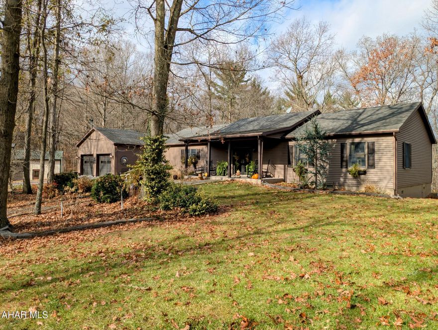 Astounding and Amazing, two words to describe this Beautiful home. One level living, open concept gourmet kitchen with large walk-in pantry, dining area, living room with inviting gas fireplace. Primary Bedroom is spacious with its own full bathroom, complete with shower and soaking tub. A fantastic walk-in closet which even has chandeliers. Head back the hallway from the kitchen and find two other nice size bedrooms, large laundry room, washer/dryer included and has plenty of workspace. Heat is geothermal and home also has central air.  Walk out the French doors to a covered deck that offers space for ultimate relaxation , and an even larger open deck space. Attached two car garage , has a 220 line for charging your hybrid. Sweet potting shed, wisteria covered gazebo with swings, front porch with comfy rockers and a koi pond which homes lots of Koi.  Three bay detached garage with a fourth bay area to park your RV or Boat. Don't miss the letter from the owner on the counter. This home has it ALL!