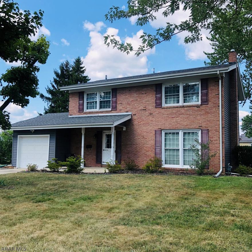 Attractive 2 story brick home in Garden Heights on a large lot. This home is well designed and cared for. It includes beautiful hardwood floors throughout, 3 Bedrooms, 2 with walk- in closets. Master bedroom includes I/2 bath.  Large eat-in kitchen w/ sliding glass door leading  to a lovely covered deck and large back yard. There are plenty of closets, 1st floor Laundry, Impressive stairway and all newer windows.  The basement has been Professionaly Water proofed.  New Furnace 2016, Cenrtral Air can easily be added. This is a must see home!