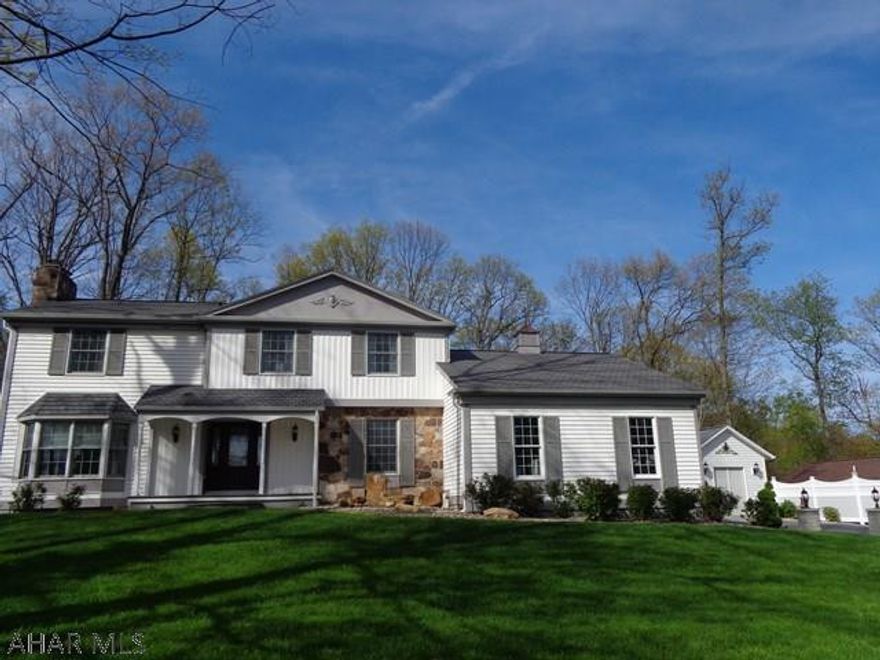 DRASTICALLY REDUCED!  Motivated Seller.  Become lost in it's beauty with this 5 bedroom luxurious home located on a quiet cul-de-sac street in Stonehedge. Tastefully updated kitchen with granite counter-tops, porcelain floor. Spacious 1st floor laundry. Enormous 1st floor master bedroom with a sitting area, his and hers walk-in closets, and also a large master bathroom with jacuzzi tub. There is also a 2nd master bedroom on the 2nd floor with fireplace. This home will exceed your expectations because there are a splendor of amenities...skylights, laundry chute, pocket doors, central vac, instant hot water tank, security system, wine room. Perfect outdoor entertaining area with a swimming pool and hot tub.  Check out the video.