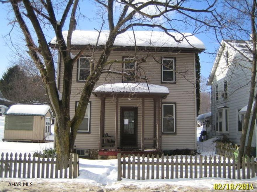 Spacious Tyrone vinyl 2 story with large lot. Formal living room and dining room plus large eat-in kitchen. Needs TLC. Being sold AS-IS. Seller will make no repairs.