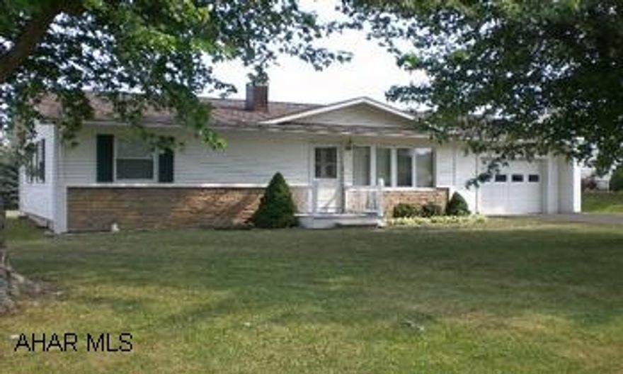 This ranch home is immaculate.  It offers a new kitchen with a ceramic tile floor, den with a wood burning stove, new bathroom, beautiful hardwood floors in the living room and bedrooms, a new concrete patio in the rear to relax on and a new shingle roof.  The home is superbly maintained.  (Directions:  From Bedford take Route 30 west to a right into Lakewood.  Go straight to the property on the right.)