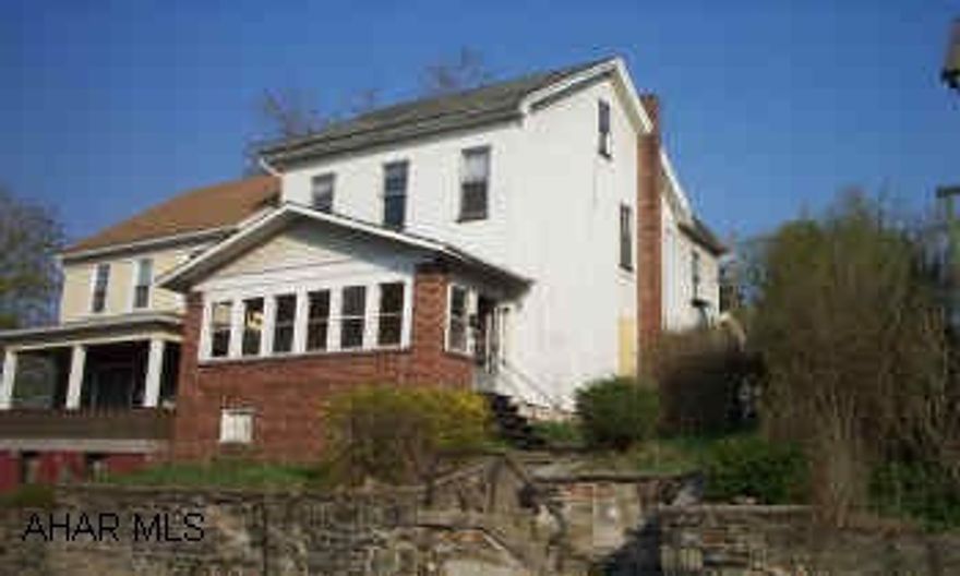 Updated wiring, off-street parking. House was bringing $400/mo. Motivated owner!