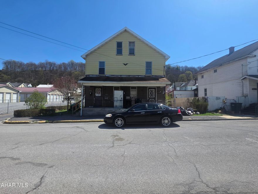This side-by-side duplex features two units, each with a living room, dining room, and kitchen on the main floor. The second floors contain two bedrooms, one bathroom, and a bonus room.  Both units need TLC. Currently one side is rented  a on month to month lease. Schedule a tour.