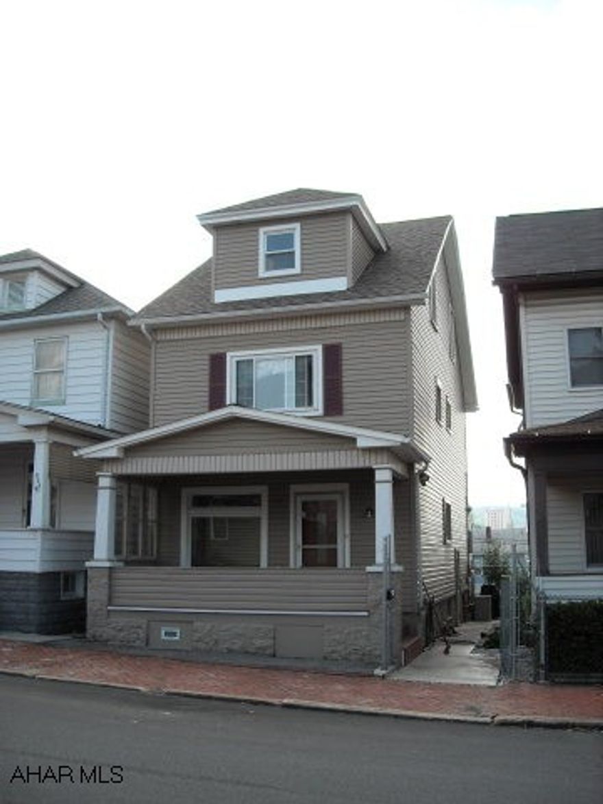 Reduced! Renovated and well done! 2-3 bedroom, 1 full and 2 half baths. New roof, flooring, siding, doors, windows (95%), and electric service -  Laundry on 1st flr, Florida room in rear with exhaust, whole house exhaust fan on 3rd flr, space heaters, wall A/C, and much more!  Very little to do - Possible Credit to finish.  1 car detached garage, off street parking, fenced in yard with landscaping.  Don't hesitate on this one!  Elegant ceiling fans.  Home warranty.  Just give a call!!