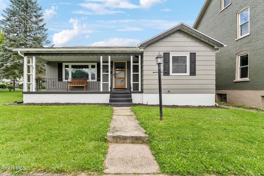 Move right in to this stunningly remodeled home with an extra lot and detached garage. Featuring 2 bedrooms and 2 bathrooms, this home has too many updates to name. You'll love the gorgeous kitchen with neutral colors, oversized sink, and included stainless steel appliances. Newer flooring and paint throughout the whole home. Beautiful full bath with waterfall showerhead and custom tile on the main level. Downstairs, you'll find a full basement with epoxy floors & a remodeled 3/4 bath. Lots of possibilities for this space with two new sump pumps & a newer hot water tank. Step outside and enjoy your large fenced-in yard AND an additional included lot next door! Detached garage for added convenience of off-street parking. Home sweet home!