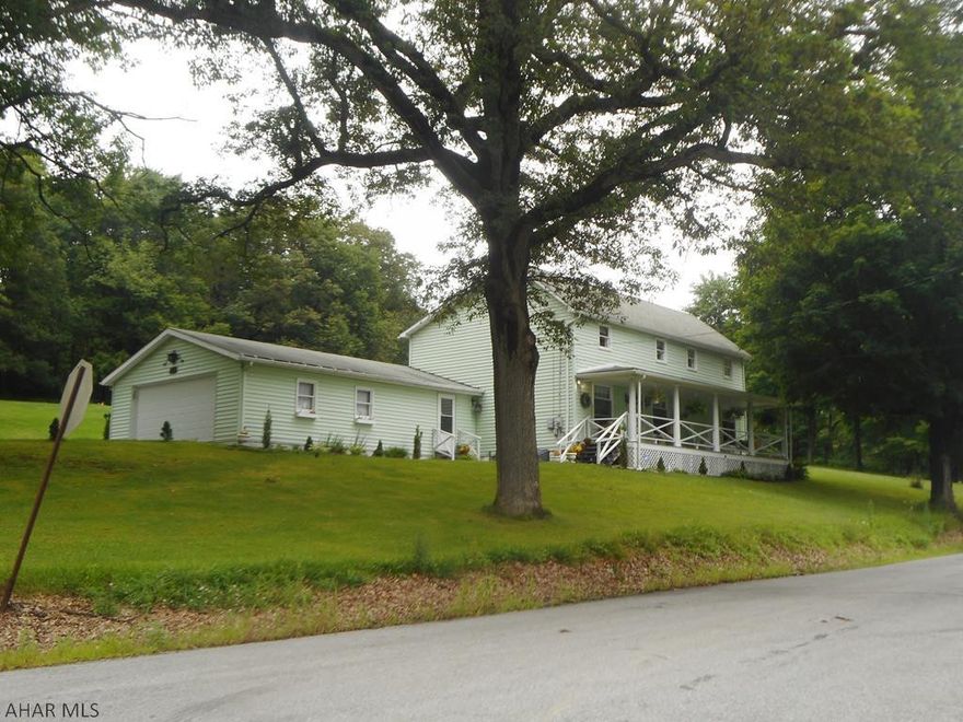 Beautiful country home sitting on 2 lovely, usable, clear acres. This home features a galley kitchen with all new S/S appliances, new S/S front loading washer/dryer, new light fixtures throughout, new furnace, new high end carpet, new landscaping, new security system and house totally repainted inside and out. 4 Bedrooms with large Master and plenty of closet space. 2 car garage with lots of storage and mudroom. Lovely large porch w/ swing welcomes you to this move in ready home.