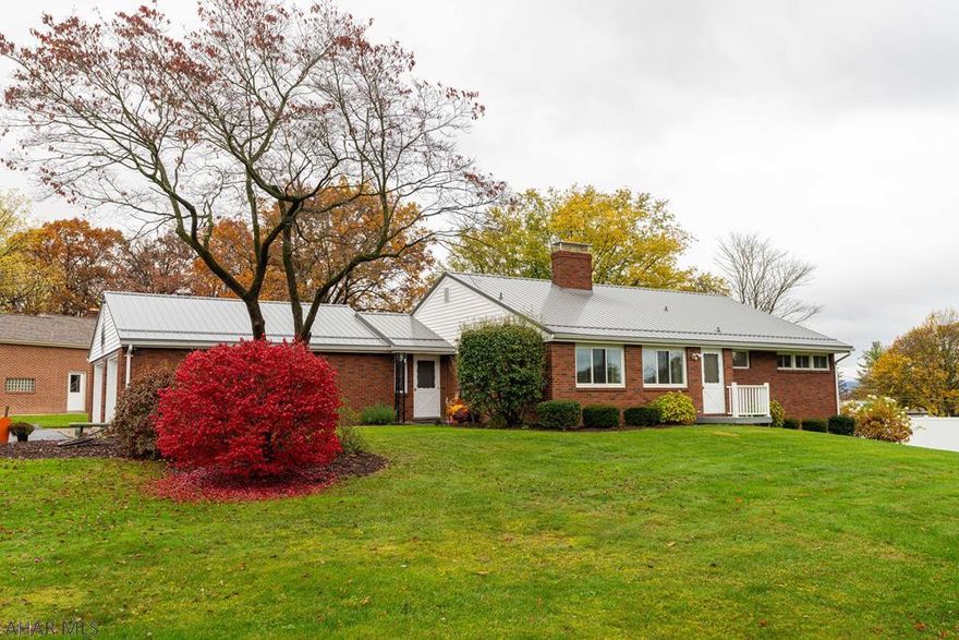 This beautiful One-story home on .62 acres in the very desirable Sylvan Hills area is the perfect size for just about any family.   Recently updated throughout, this immaculate home offers Fineline cherry cabinets, new luxury flooring,  paint,  baths, newer SS appliances with full, transferable warranty,  recessed lighting, and a partially finished walk-out basement.  It also offers Central a/c, radiant heat, spacious sunroom and  large patio  for entertaining.  Paved parking for 6+ cars. a 2 car garage, and storage shed. Owners have permit for approval to install  in-ground  pool.  Range and MW have convection capabilities.  Lighting is economical low voltage.  By entering the home, visitors and agents give permission to possibility of video recording.