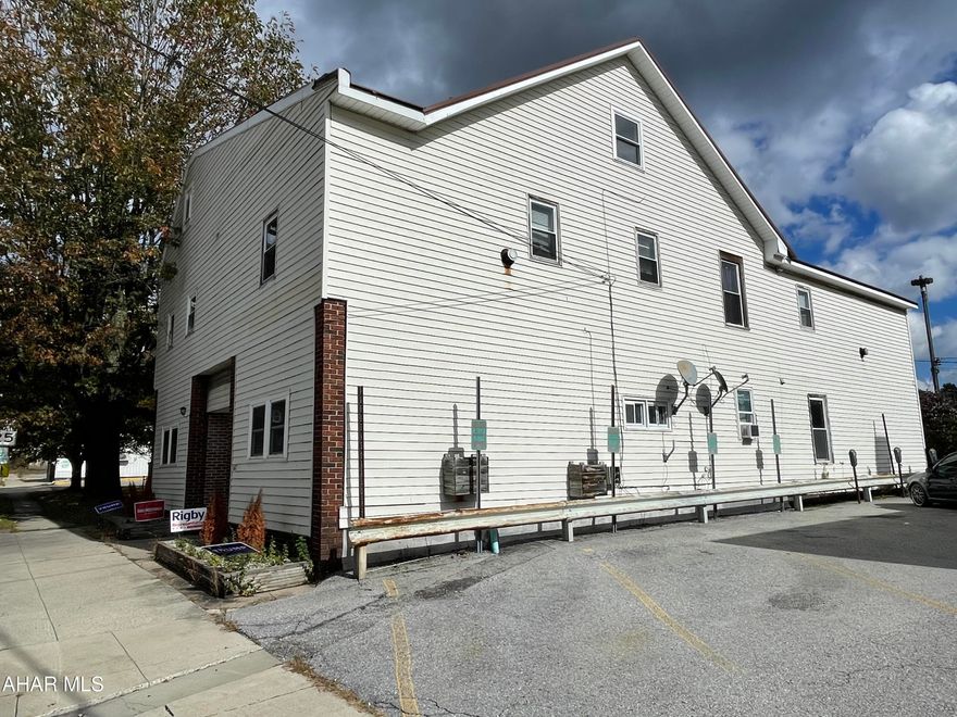 Add to your rental portfolio with this well maintained commercial building and house complex in the heart of Cresson Borough where you are within walking distance to all local businesses. There are 8 units total, 7 in the commercial building and the house.  House was purchased a few years ago to give tenants additional parking.  Potential to add additional income with a bonus area that could be set up as laundry for the building.  Several units recently renovated.  Water sewer trash are included in the rent. All units occupied.