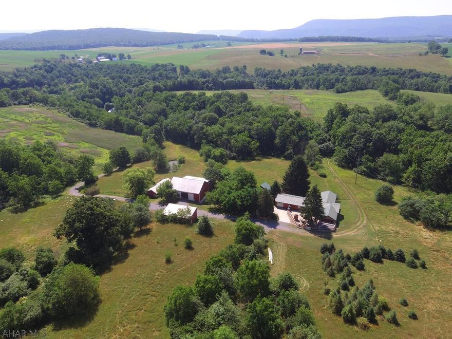Beautiful country farm with a hard to find setting in Central, PA. This property offers 105+/- acres with a 3 bedroom - 3 bath home, multiple outbuildings, bank barn, pond, open and wooded ground, and so much more! The home offers an open concept with a great room, finished basement, theater room, fireplace, screened porch, and more. The setting of this farm provides an excellent location to kickback and get away from the hustle and bustle. The outdoor fireplace, pool, decks, and entertaining areas make this property a great place to invite your family and friends over to enjoy all with easy access to I-99, State College, and Altoona.