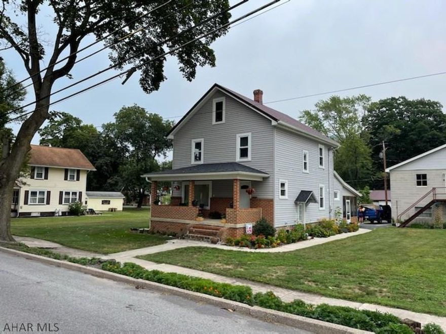 This beautifully remodeled home is a must see!  All new wiring, PEX plumbing, & Lennox boiler.  The covered/screened in back patio is the perfect place to relax or entertain.  The gardens are breathtaking and the large 44x31 ft two story garage could be used for a commercial automotive shop. The 2nd floor to the garage has separate outdoor entrance.  Within walking distance to the community park, this home is also conveniently located between Altoona and Bedford.
