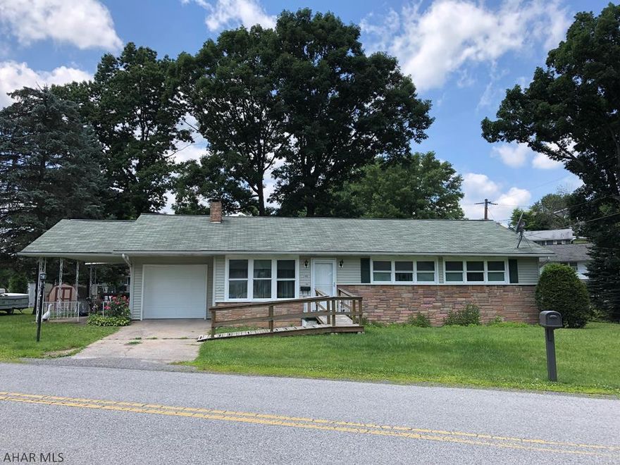 Beautifully maintained and updated ranch-style home in the East End/Greenwood area. 3 bedrooms, 1 full bathroom, Pittsburgh toilet in the basement.  All new windows throughout, recently renovated kitchen, heated garage with new garage door.  Full, unfinished basement with tons of potential.  Covered patio to the side.  58x85 lot across the street is included.  Don't miss your chance to own this beauty!