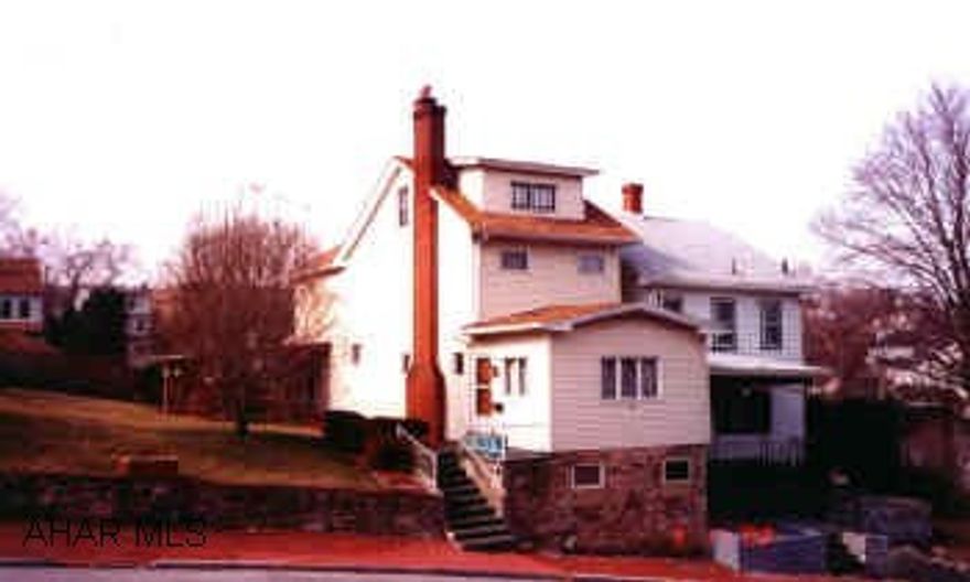 DOUBLE LOT. 2 STORY IN ALTOONA. 3 BEDROOM. 1.5 BATH. SIDE DECK. VINYL SIDING.