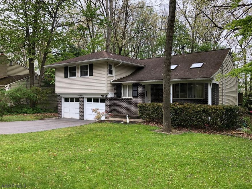 Lots of Space:  Located in Park Forest Village, a family friendly neighborhood, this "Cherry Valley"  styled split level home offers the homeowner lots of usable space.  For starters, from a spacious living room with skylights and ceiling fan to an "in-law" suite with kitchen, bath, bedroom and living room with walk-out  to a covered patio, to a family room with wood burning fireplace, space is what you get.  Three additional bedrooms and two full baths are located on the  upper level.  To the rear of the home si a 24'x12' deck ideal for relaxation and those summer cookouts.  The fenced rear yard is ideal for the safety of a pet or young children.  Close to shopping, entertainment, Penn State University, and downtown State College.