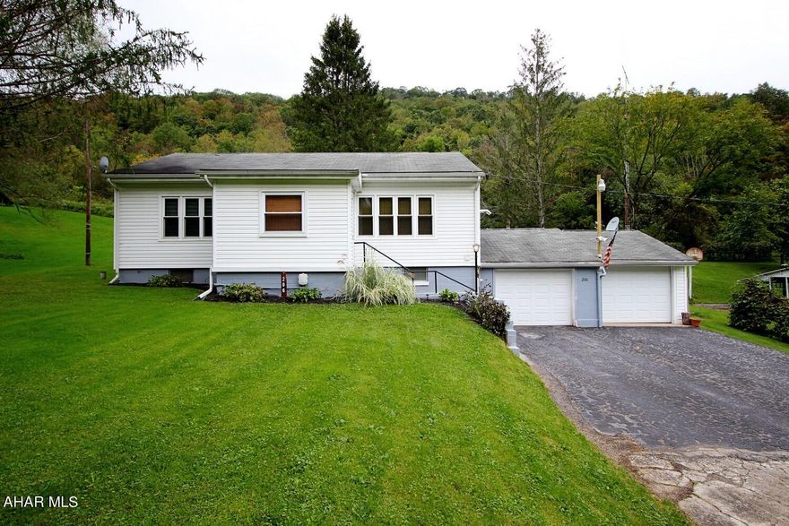 Two bedroom ranch in a country setting with fenced yard, hardwood floors and a 2 car garage.  Bonus room ideal for an office, nursery or similar.  Eat-In Kitchen.  Central Air.  Newer mechanical systems.  Whole House Generator.  Public Sewer.  Enclosed Back Porch.  Front Entry Mudroom.  Replacement Windows and more, including a full unfinished basement with a shower stall and additional bathroom plumbing.  Schedule your private home tour today!