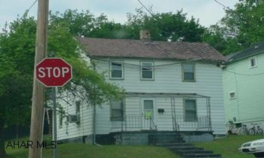 HANDYMAN SPECIAL!  Great opportunity for investors.  3BR main house and 2BR rear apartment over a 2-car detached garage.  New deck.  Sold as is - needs work. HANDYMAN SPECIAL!  Great opportunity for investors.  3BR main house and 2BR rear apartment over a 2-car detached garage.  New deck.  Sold as is - needs work.