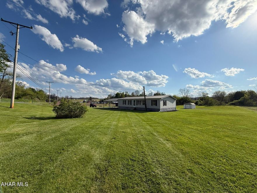 Enjoy the space, privacy, and setting that make Warriors Mark such a desirable place to call home. Situated on 1.4(+/-) acres of owned ground, this 3-bedroom, 2-bath home offers comfortable living in a beautiful rural location while still providing convenient access to nearby amenities.

Inside, the home features a spacious layout with a large living room, central air conditioning, and numerous remodeling improvements already completed. The open feel of the home creates a comfortable flow throughout, with plenty of natural light and flexible living space.

Outside, the property truly shines with wide open yard space, room to enjoy the outdoors, and an included swimming pool for summer enjoyment. The mostly flat land offers endless potential for outdoor entertaining, recreation, gardening, or simply enjoying the peaceful surroundings.

Properties with acreage in Warriors Mark are hard to come by, especially with this combination of space, setting, and value. Don't miss the opportunity to own a property in one of the area's most sought-after rural communities.