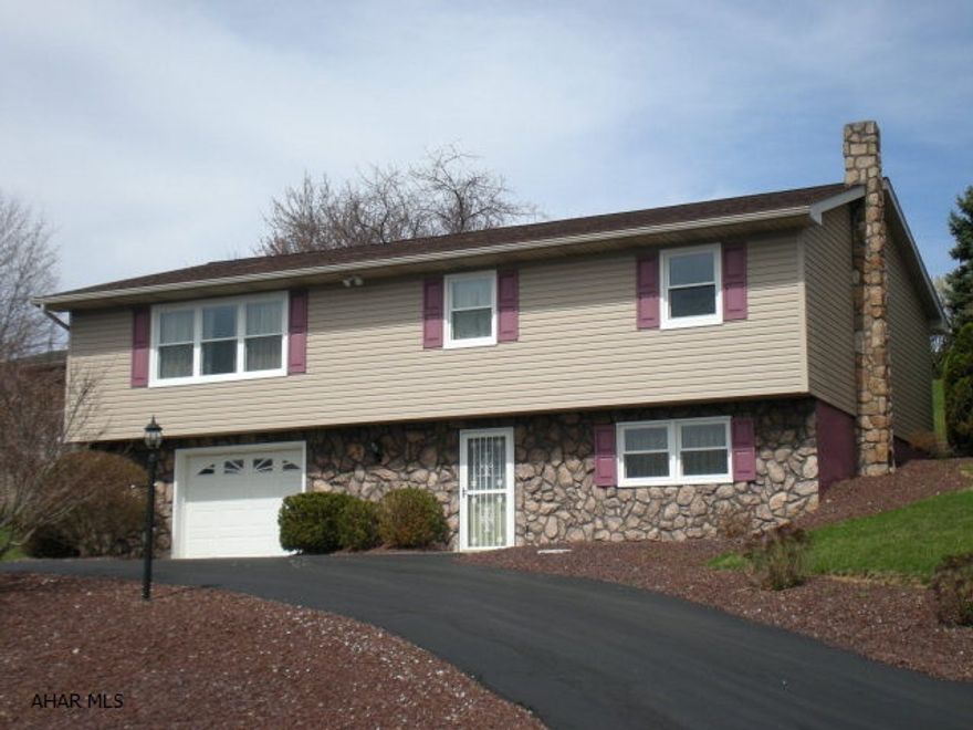 Well maintained home in desirable Rolling Hill with terrific mountainous view to enjoy from inside. Large Family Room with Berber carpet and a Wood Burning Woodsman Stove for those cooler days.Plumbing exists to install a 2nd Bathroom in the Basement Adjoining the Family Room. Newer Windows (1 Year approx), ECO Water Treatment System and Ultraviolet Disinfection Unit (filter), 80 Gallon Electric Water Heater,Heat Pump and Central AC.