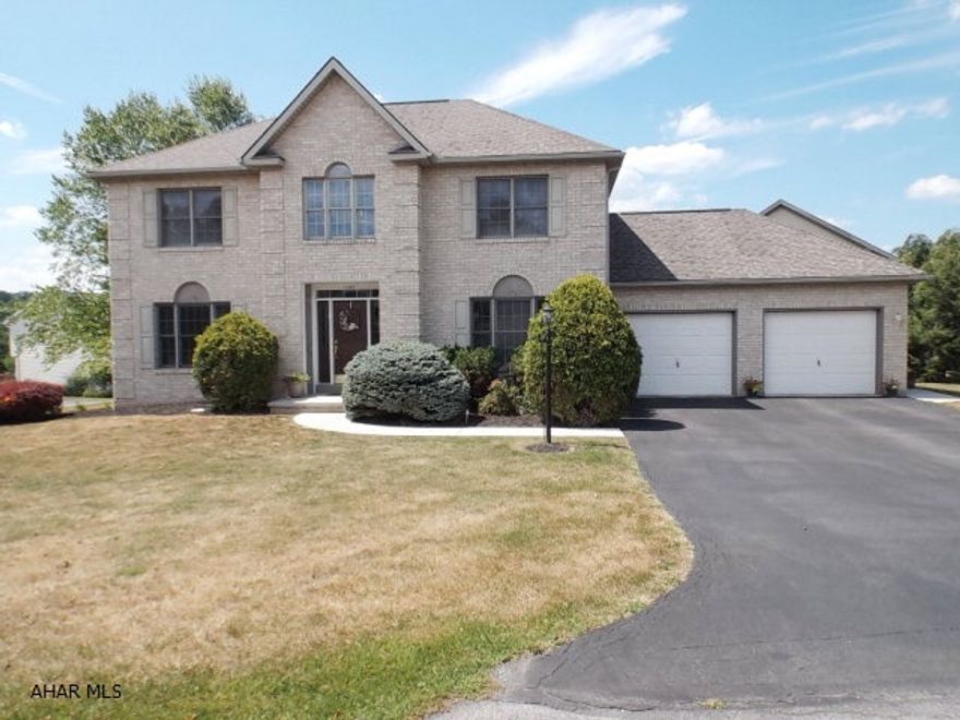Open entranceway allows lots of natural lighting. Kitchen is open to informal tile dining area and family room making it a pleasure to cook and interact with guests. Features include oak cabinets accented with granite countertops and breakfast bar, stainless gas range, dishwasher, garbage disposal. Family room has gas fireplace, bamboo floors, and doors to patio.  Formal dining room with bamboo floors gives you the option for more formal entertaining. Master bedroom offers a walk-in closet, Master bath with jacuzzi tub, walk-in shower, and granite double sink. There's a second family room in the basement along with a bdrm w/walk-in closet, another bdrm w/dble closet, and a full bath. Space abounds in this quality built home. Two car attached garage has pull down stairs for lots of storage.