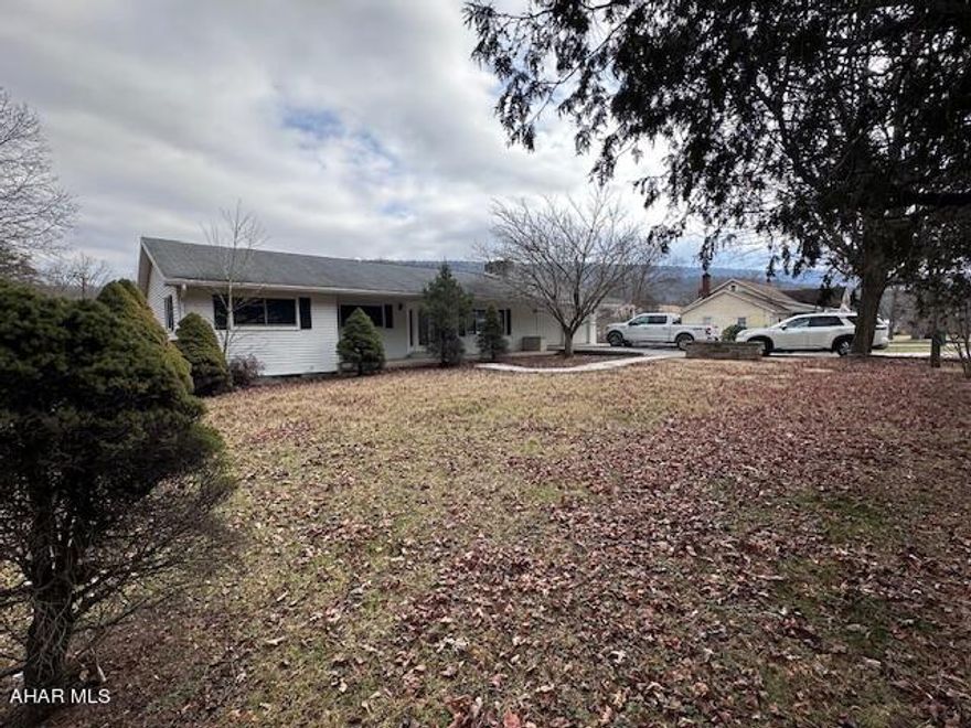 This mountain home is a must see if you are looking for a small home town setting. Just recently completely remodeled for your enjoyment. The newness of the home will delight you as you step through the front door. The comfy feeling of a large kitchen/dining room makes for endless good memories of family togetherness and Mom's home cooking. Stay warm on these cool winter evenings in front of the magnificent fireplace in the living room, play games, chill out and entertain in this large open room. The flow of the rooms in the home make it great for entertaining and having get togethers , you will not want or space in this home. The closed in sunroom is the perfect location for gazing out into the backyard at the wildlife and occasionally you will see the trains from the historic East Broad Top Railroad chugging down the tracks. This home is perfect for the train enthusiast. Just minutes from the historic East Broad Top Railroad and Trolley Stations. Sit back, prop up your feet and listen for the distinctive whistling horns of these historic steam engines. Reminisce about a slower time when life was less fast paced.