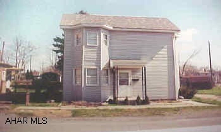 Two story vinyl siding.  Three bedroom.  One bath.  Living room.  Dining room.  Sitting room/office. Well maintained three bedroom home.  Modern kitchen.  Being sold in "as is" condition.  Vacant -- key in office.