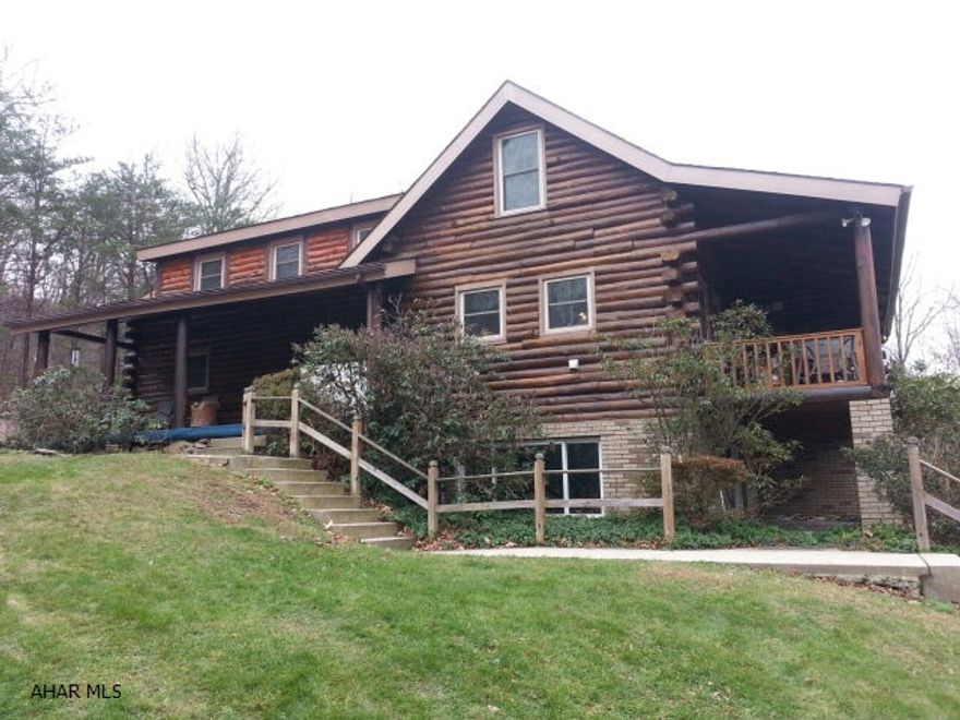 Are you looking for seclusion? Then look no further! This extremely wellmaintained log home sits in a very tranquil location, and is a huntersparadise. Perfect for year round living, weekend get away or retirement home.The hardwood floors and stone work are just a couple amenities that willmake you feel right at home. Don't miss the chance to be minutes from ShyBeaver boat launch on Raystown Lake, and enjoy all that mother nature hasto offer. Call today to schedule you tour --