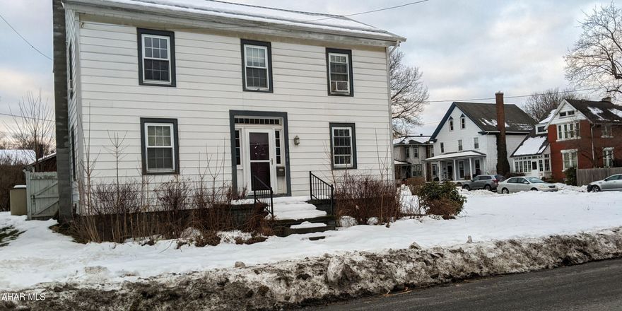 The property at 508 E Pine St, Philipsburg, PA, presents a unique opportunity for those looking to infusetheir personal touch into a traditional-style home. Built in 1914, this 3-bedroom, 1.5-bathroom detachedresidence spans 1,584 square feet across two levels, set on a 0.13-acre lot. With the right care and TLC, thepotential to revitalize its inherent character is immense, starting in the kitchen with its cozy pine walls andabundant counter and cabinets. The home features an unfinished basement, aluminum siding, and a metalroof. Additional highlights include a distinctive outdoor seating area within an electrified 10x12 shed, agravel driveway, and a partially fenced yard. The heating system operates on hot water and oil, and theproperty is serviced by public water and sewer. This property, needing sprucing up, is ideal for those eagerto undertake a project to bring out its full charm and appeal.