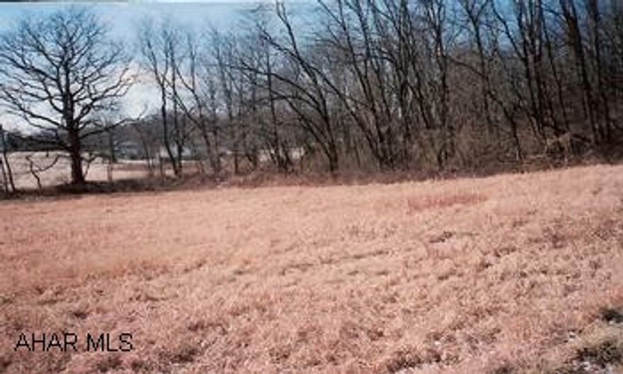 Nice one acre building lot, Bedford Schools. Minutes from town. Some restrictions, need perk.