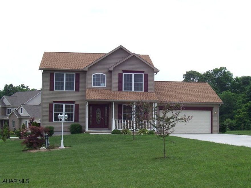 Impressive 2 story home in an up-scale residential development. Open floor plan and spacious rooms. Nicely landscaped on a level lot with great a view. Features include: country oak kitchen with ceramic flooring, oak hardwood floors throughout, main level laundry, open foyer and a covered deck! Move in condition!