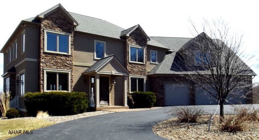 Magnificent Crossman, Castle & Morina open concept home on 6.72 acres with fabulous 360 degree views. Kitchen features double ovens, six burner cooktop, double dishwashers, large wine cooler & granite. Radiant heat except childrens rooms. Office has view of Horseshoe Curve and reservoir. This property has a sauna, a hot tub and a finished basement Total 5,930 sq. feet. 3 car garage.