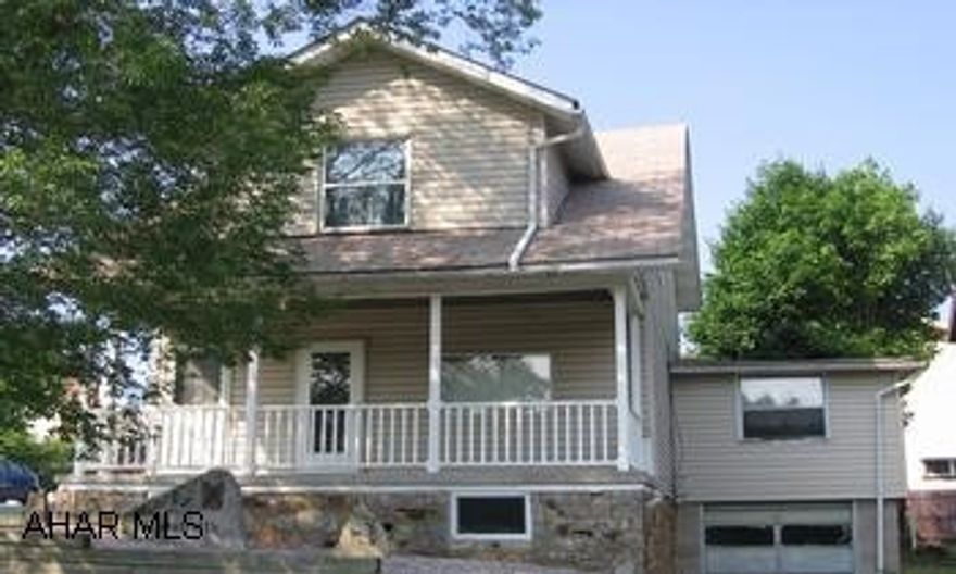 2 story home in Calvert Hills! Features a must-see kitchen, 2 full baths, newer windows & siding. Corner lot. Was duplexed at one time, could be easily converted back. Calvert Hills!  Corner lot!  2 story home features a must see kitchen, 2 full baths, newer windows and siding. It was duplexed at one time, and could be easily converted back.