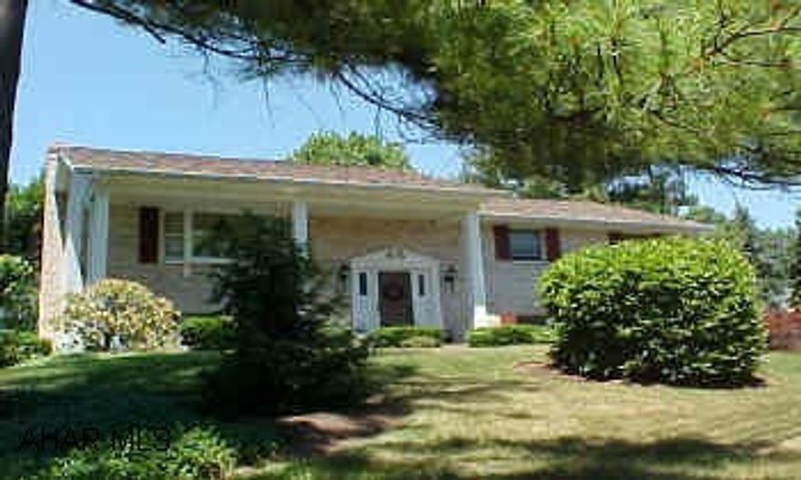 Immaculate, top of the line upgrades, new insulation in attic, pull down attic, whole house fan. Extremely nice split entry!! Tile floor in garage, corian tub surrounds, new counter tops, Woodmode kitchen, maple & vanities, fireplace in family room, screened porch n rear, beautiful landscaping.