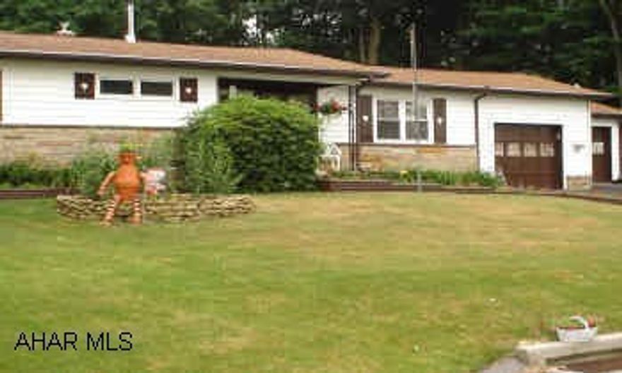 BEAUTIFUL MAINTAINED AND UPDATED RANCH ON LARGE LOT. NEW ADDITION WITH FAB. SUNROOM, EXTRA LARGE DINING ROOM, LOVELY HARDWOOD FLOORS! ABSOLUTE MOVE IN CONDITION