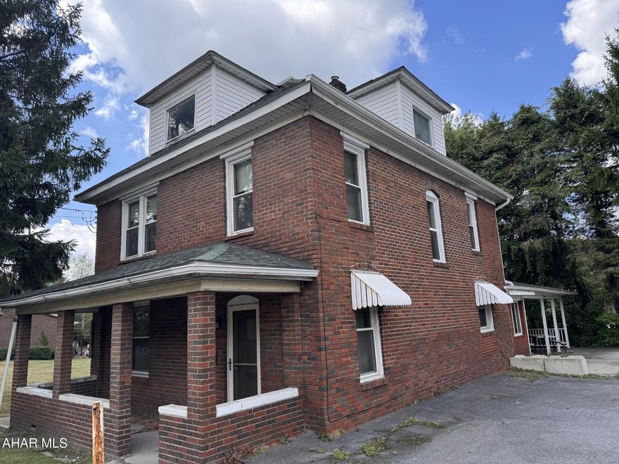 Two story brick home with 3-4 bedrooms.  Spacious kitchen , formal DR, LR, 1st floor laundry & family room with wood fireplace.  Oil HW cast iron & radiator heat.  Side porch & patio.  All appliances included.