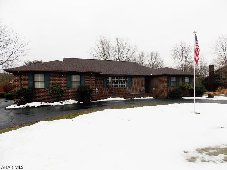 Immaculate brick home in Bellwood Antis School District! Gorgeous eat-in kitchen that features new granite countertops, a tile backsplash, and stainless steel appliances. You will love the kitchen island that is the centerpiece to an amazing open floor plan! Stunning living room with new flooring and skylights. Lovely dinning room that has French doors and tons of natural light. Spacious master bedroom that has a walk-in closet. Stunning master bathroom that features marble floors, a tile shower, and a double vanity. The second bedroom has a walk-in closet and a remodeled bathroom. Beautiful bonus room that would make a great 4th bedroom. Heated 2 car garage gives plenty of storage. Private yard with new fence! Enjoy outdoor entertaining on the patio and behind the bar. Relax in the pool!