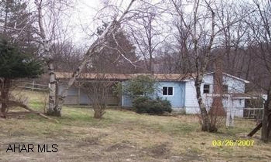 Property being sold in as-is condition.  Includes barn and two outbuildings.