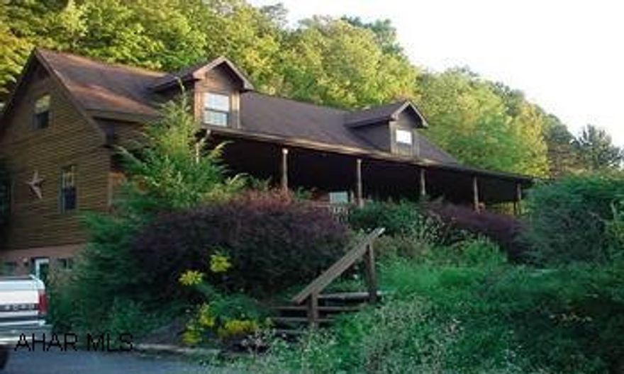 1 1/2 story on 2.9 acres with great view. 1 1/2 story on 2.9 acres with great view. Sale must receive bank approval.