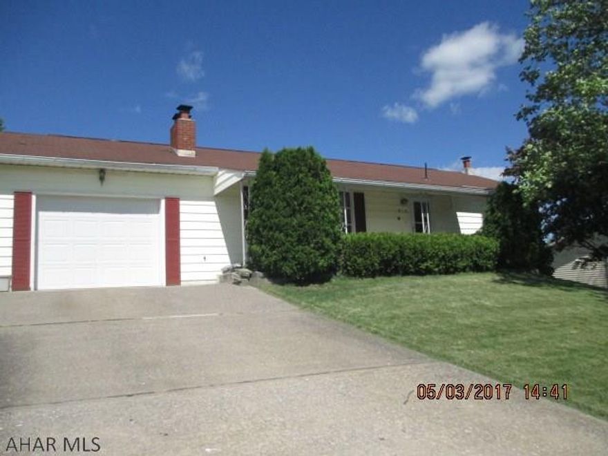 Really Nice AND WELL KEPT RANCHER WITH 1/3 ACRE IN A VERY NICE RESIDENTIAL NEIGHBORHOOD.  House has Electric heat with Heat Pump and baseboard storage heat.Beautiful stone fireplace in the living room and newer Pergo Flooring.  Newer refrigerator and sink in Kitchen, double oven.Central air throughout. Some planeling ,carpet, pergo  and ceiling tile.House is vinyl sided, Roof age 1993.  A 3 season sunroom in the rear and nice patio to enjoy the nature. Finished family room in the basement with New Kitchen cabinets