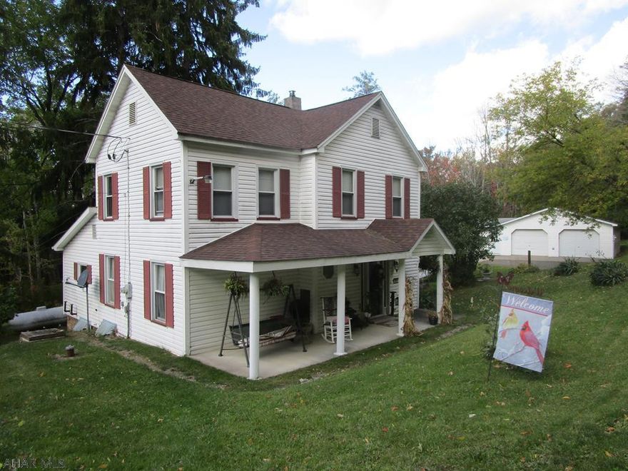Nicely remodeled two story vinyl sided home on a acre lot. Home features remodeled interior with kitchen, living room, formal dining room, full bath with jet tub and laundry room on 1st floor. Second floor has 3 bedrooms and a .75 bath. Drywalled walls and laminate and w/w floors. Heat pump and oil hw heat. Generator included.  Nice detached two car garage with small office attached.