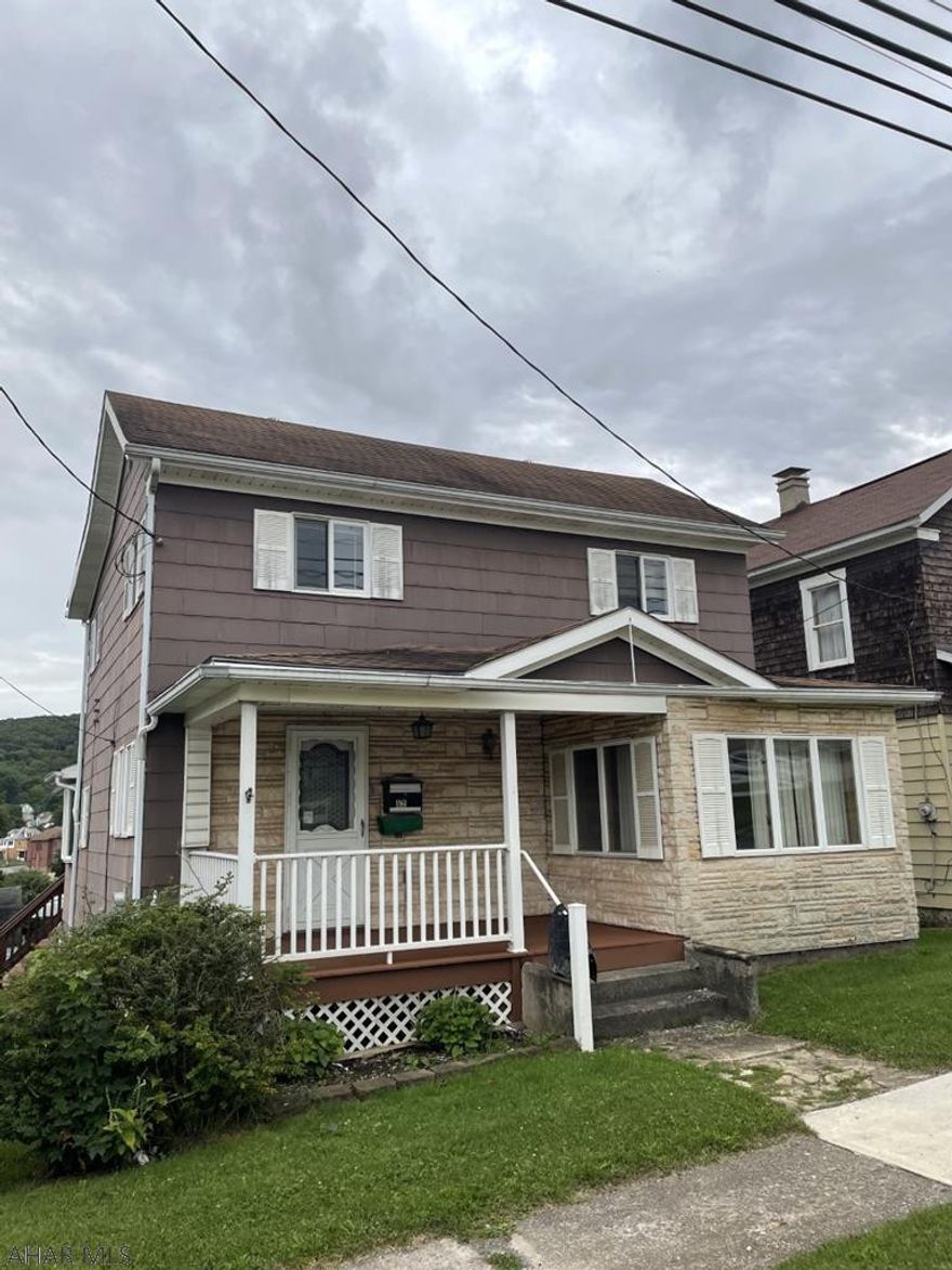 Nanty Glo - 2 story three bedroom, 1, 3/4 bath home on level lot.. Oil, hot water heat.  2 car integral garage