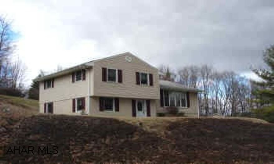 MANY UPDATES.  SUPER LOCATION IN LOGAN TOWNSHIP.  FAMILY ROOM ADDITION IS WIRED WITH 5-1 SOUND.  SHED IS INCLUDED (14X24).  PRIVATE SETTING.  14X24 DECK.