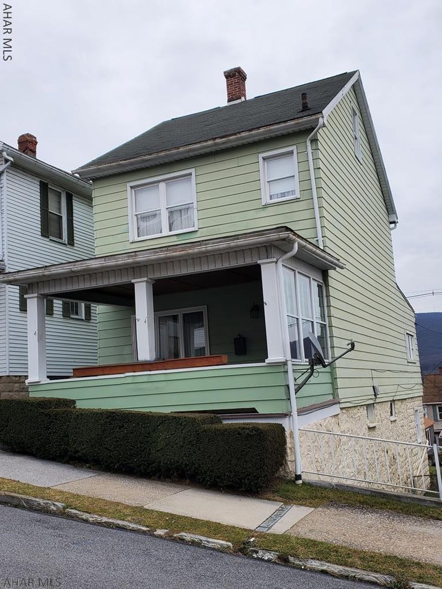 2 bedrooms, 1 bath, gas forced air with public water and sewer. Shingle roof, aluminum siding, covered front porch and very nicely maintained.