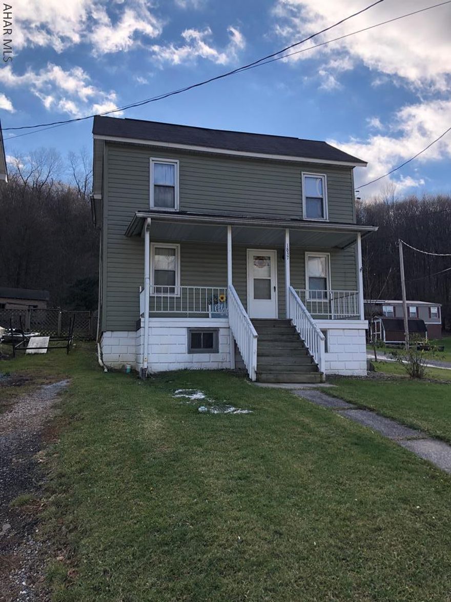 This well maintained property features a fenced yard and a detached garage. Kick your shoes off inside the spacious mud/laundry room. Plenty of storage inside the kitchen which also has a pantry, and features a new backsplash. 3/4 bath on the first floor perfect when entertaining family and friends. Finishing out the first floor is a dining area and a living room. The second floor has 3 bedrooms and a bathroom. The blue bedroom has had new insulation and drywall and the bunk beds are attached to the wall in the second bedroom. Relax on the covered porch or cook out on the back deck. Mud room/laundry room porch is also new. Call today!