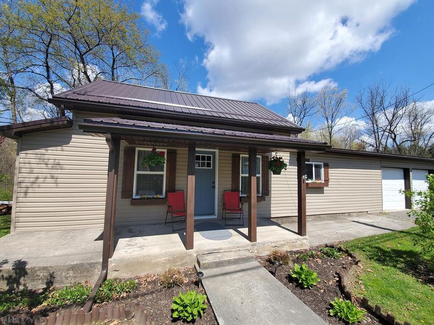 Newly renovated 3 bedroom, 2 bath home with an attached  2 car garage. This home has a newly renovated kitchen and new stainless steel appliances.  The kitchen and dining room has new hardwood floors.  The living room has a pellet stove that could be your main source of heat or secondary to the brand new oil furnace.  The seller is willing to give 6% sellers assist to any full price offer.  This house is located in Huntingdon School District.