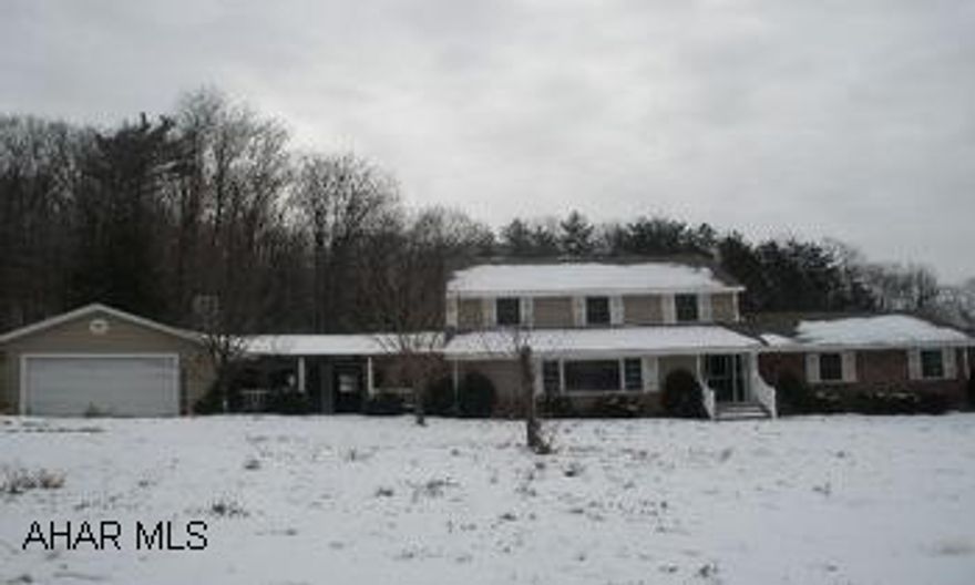 Property is being sold in AS IS condition.  The property line is directly behind the house.