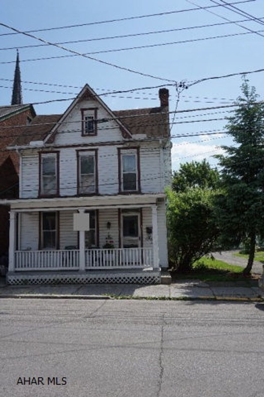 4 Bedroom, 1.5 bath home with spacious living room, kitchen and dining area. Property features off street parking with 3 car detached garage and yard in the borough. Good starter home to add your own personal touches. Original hardwood floors throughout the home.