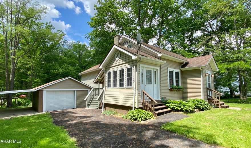 This 2750 sqft home is situated on a low traffic street in small neighborhood.  It has a large yard backing up to woods and just house away from neighborhood playground.  You will enjoy the downstairs finished basement with walk out sliding glass doors as well as your own upper level balcony off the large upstairs bedroom.  Home has an ample oversized garage for all you home projects.  Home offer a unique layout and is a must see.  Seller is the listing agent.