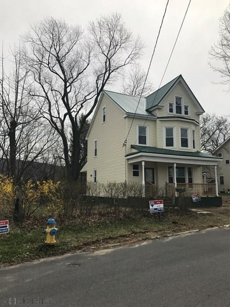 This is completely redone top to bottom. New roof, electric, windows, siding, kitchen and bath (all), flooring, furnace, water tank. Hardwired smoke detectors. it's a stunner and needs NOTHING! Triple lot, plenty of room for off street parking. Great neighborhood, easy access to everything!!! Outside work still being completed, large bedrooms, walk-in closet, stainless steel appliances. Buyer was not able to purchase. House was perfect & appraised.