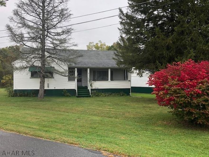 Bellwood Ranch Home with almost 2.5 acres!  This spacious home has LR, DR, EIK, 3 Bedrooms and 1 bath all on main floor!!  2nd story with 2 bonus rooms!!  2 car detached garage and a covered porch!  All at quiet location at end of street!!  Easy access to I 99 makes this property convenient for Altoona or State College work commute!!